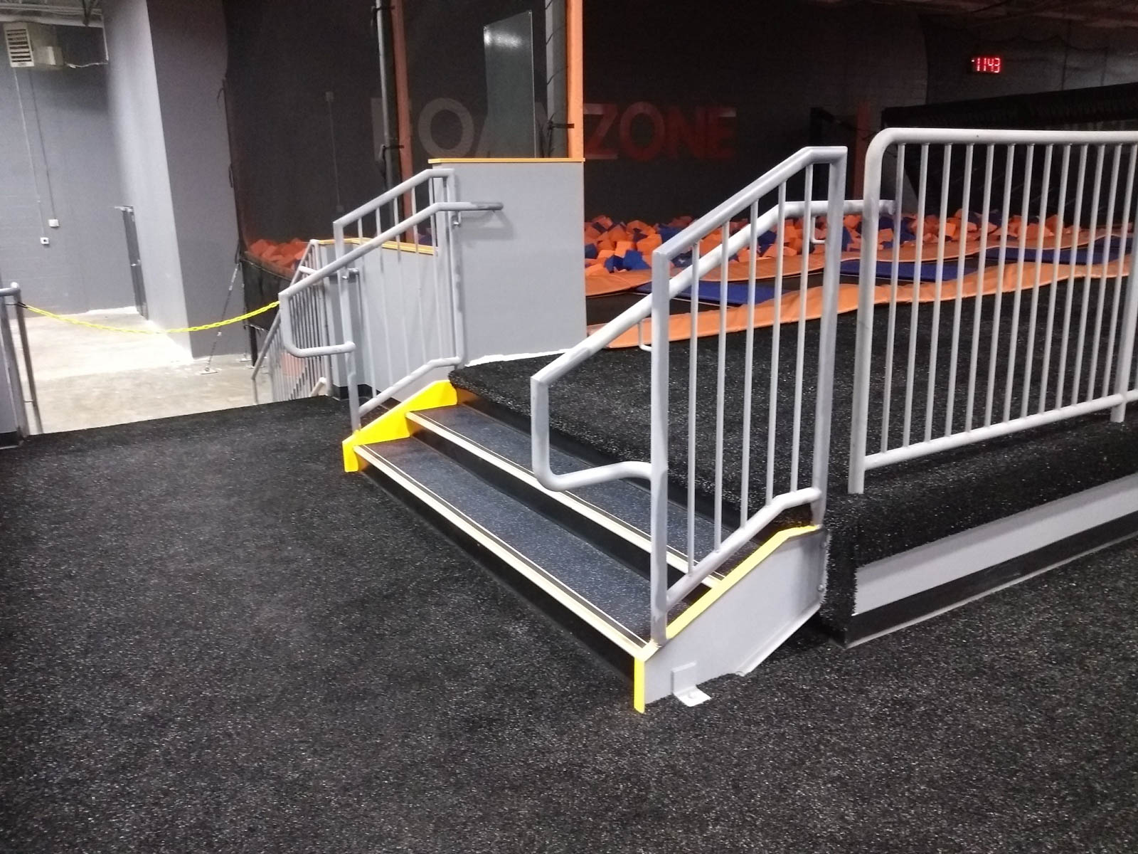 This showcases a completed loudoun stairs project within a trampoline park in northern virginia. This showcases the rails that they handmade. 