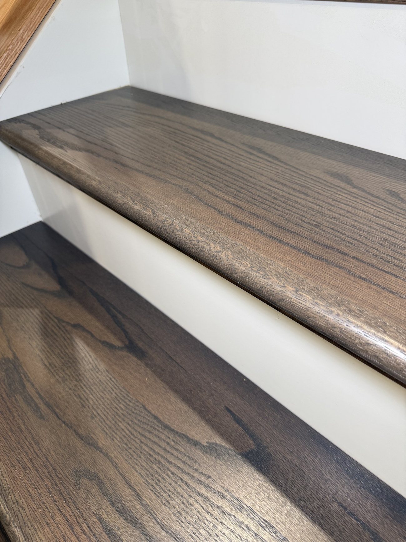 Finished stained hardwood tread